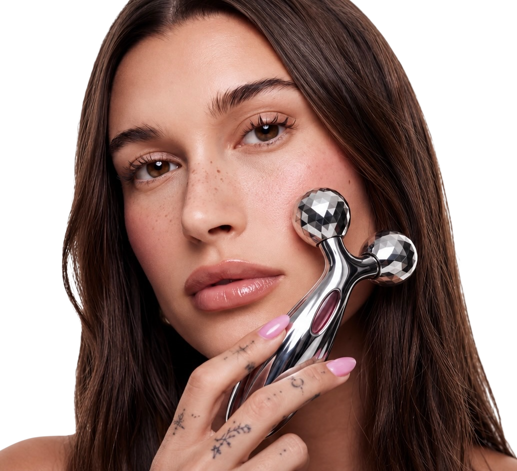Woman holding FaceGym beauty tool